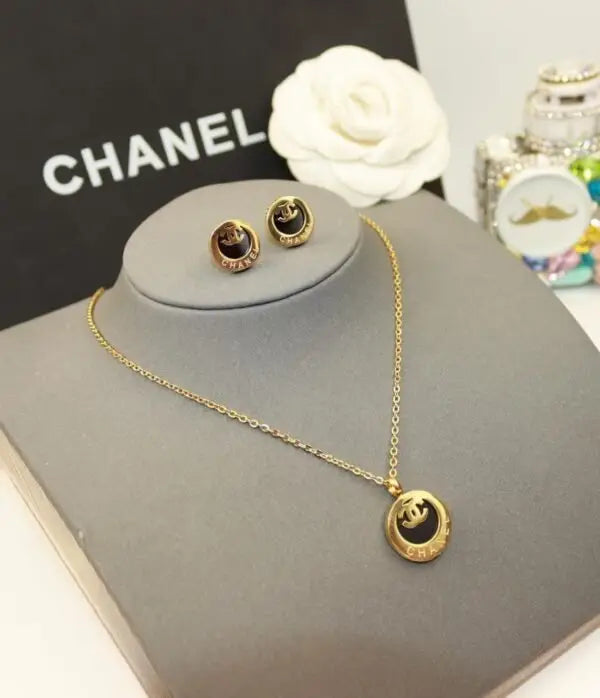 Chanel Jewelry | Vintage Inspired CC Medallion Gold Tone Resin