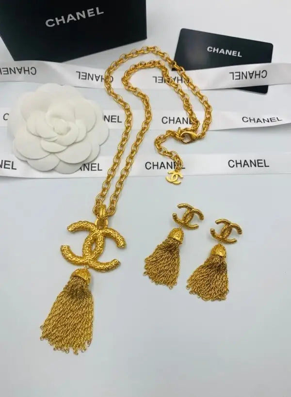 Chanel Jewelry | Textured CC Tassel Necklace & Earrings Set
