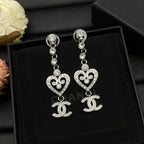 Chanel Jewelry | Heart CC Logo Drop Earrings Silver Tone