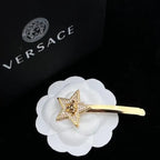 Versace Jewelry | Pavé Ball Pendant with Medusa Engraving
