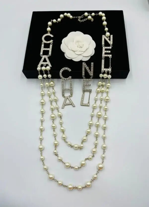 Chanel Jewelry | Turquoise Crystal CC Swirl Brooch Collection