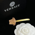 Versace Jewelry | Pavé Ball Pendant with Medusa Engraving