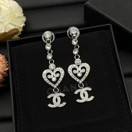 Chanel Jewelry | Heart CC Logo Drop Earrings Silver Tone