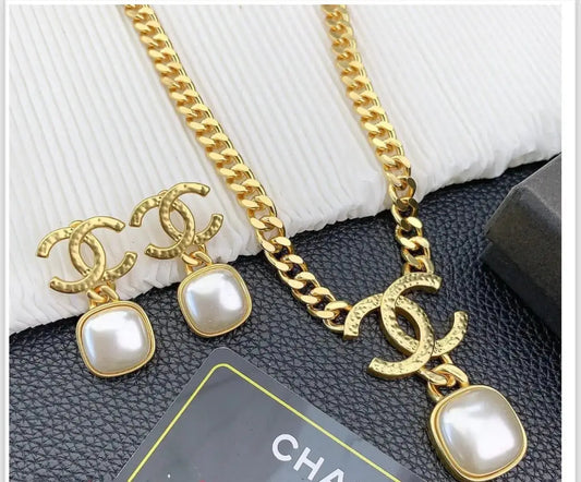Chanel Jewelry | Hammered Gold Tone CC Pearl Set