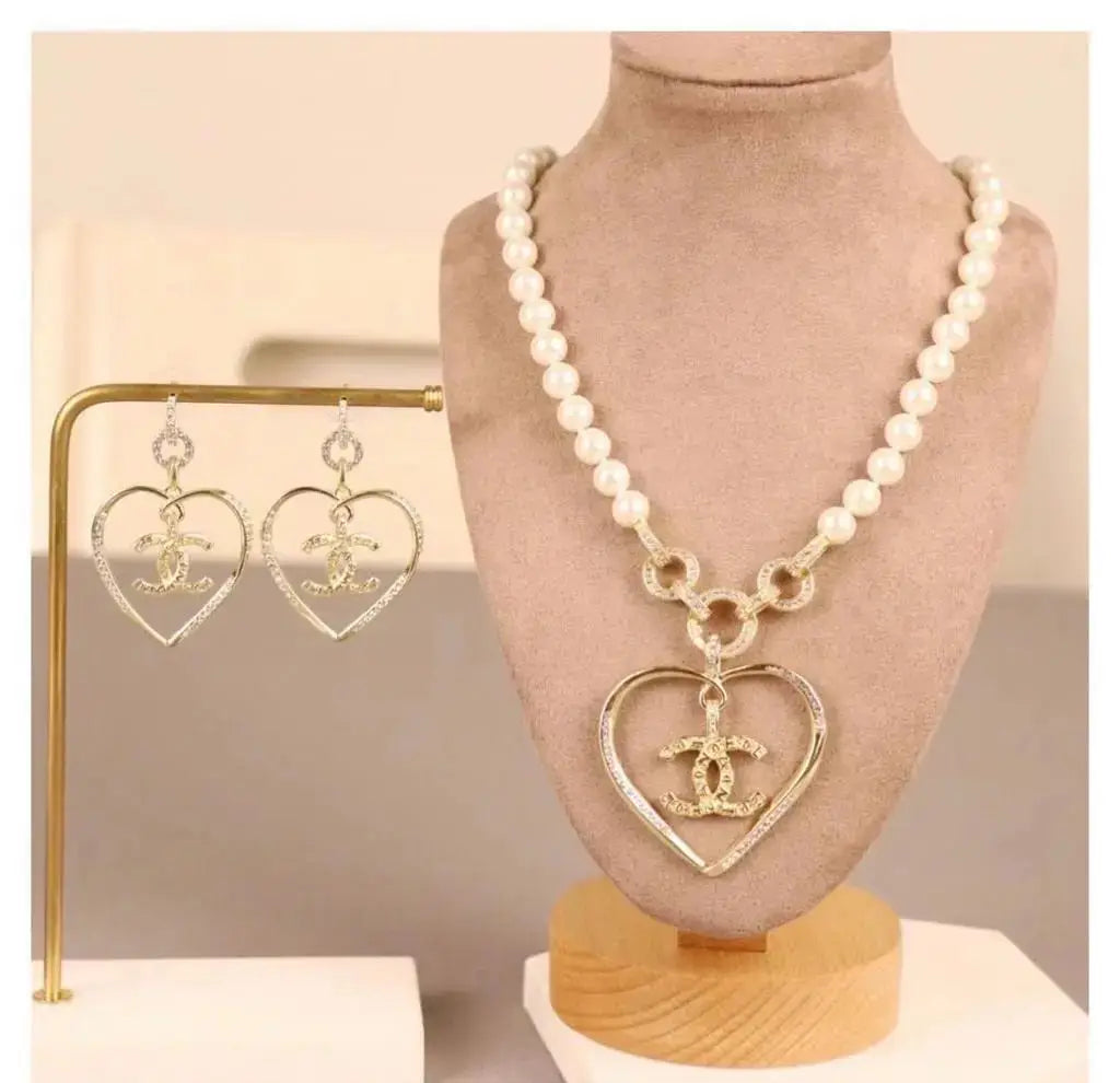Chanel Jewelry | Square Pearl & Black Cabochon CC Drop Earrings