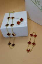 Van Cleef & Arpels Jewelry | Red Clover Diamond Necklace and Bracelet Set
