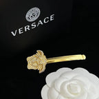 Versace Jewelry | Pavé Ball Pendant with Medusa Engraving